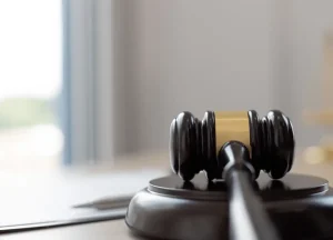 Courtroom gavel with a file folder